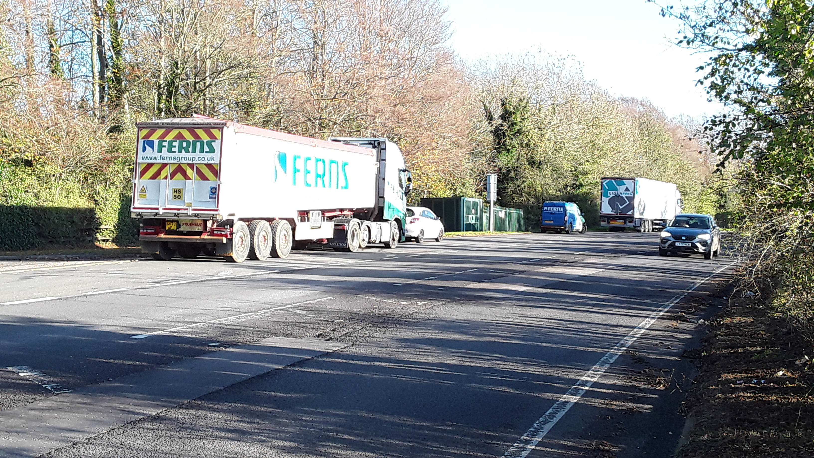 makeshift layby at entrance to a farm gate