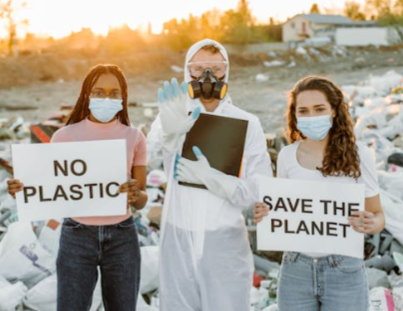 photo of people protesting against the dumping of plastic bottles